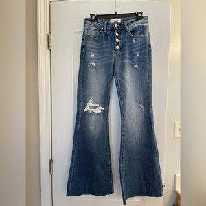 Risen Distressed Flare Jeans